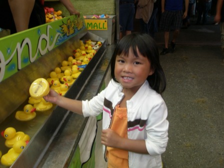 Kasen picking up ducks at the county fair